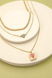 Cuello en capas con cadena gruesa y diseño de flores y corazones