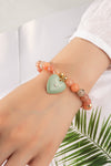 Pulsera Elástica de Cuentas con Dije de Corazón - Elegancia y Estilo