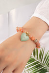 Pulsera Elástica de Cuentas con Dije de Corazón - Elegancia y Estilo