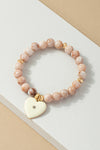 Pulsera Elástica de Cuentas con Dije de Corazón - Elegancia y Estilo