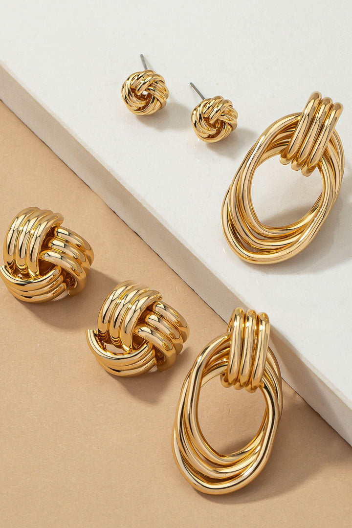 Set de Aretes Elegantes: Nudo y Aro en Tono Plata | Joyería Boutique Exclusiva