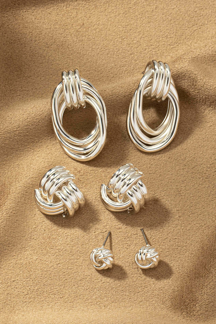 Set de Aretes Elegantes: Nudo y Aro en Tono Plata | Joyería Boutique Exclusiva
