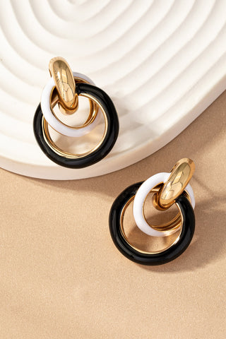 3 aros entrelazados con esmalte de colores