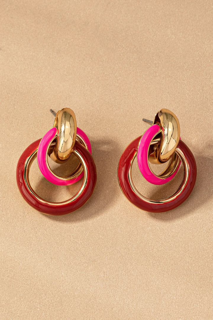 Aretes Entrelazados Con Esmalte Bicolor Hierro Chapado En Oro Brillante Edicion Limitada by Yanet Collection
