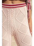 Pantalón de punto acampanado rosa