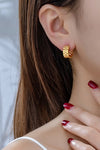 Pendientes Huggie con correa de reloj de acero inoxidable resistente al agua
