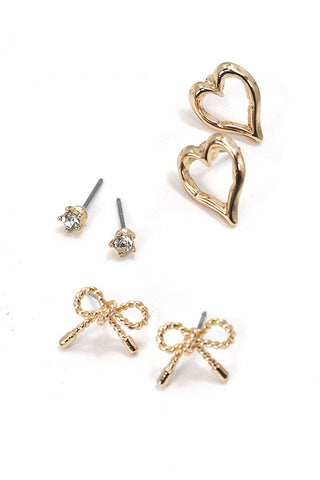 Trío de pendientes con dije de corazón y lazo