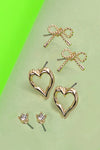 Trío de pendientes con dije de corazón y lazo