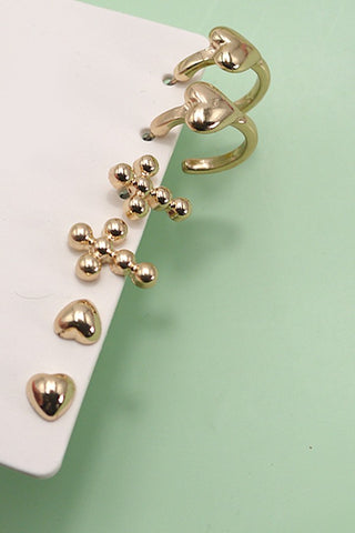 Trío de aretes de aro Huggie con cruz de corazón