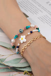 Elegante set de 3 pulseras con cuentas, flores y cadena - Realza tu estilo