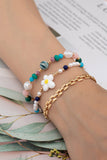Elegante set de 3 pulseras con cuentas, flores y cadena - Realza tu estilo