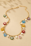 Collar de flor de vidrio esmaltado y perla de agua dulce