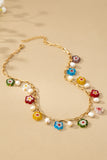 Collar de flor de vidrio esmaltado y perla de agua dulce