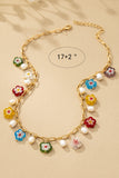 Collar de flor de vidrio esmaltado y perla de agua dulce