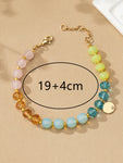 Pulsera Multicolor de Cuentas con Dije de Moneda - Elegancia y Estilo