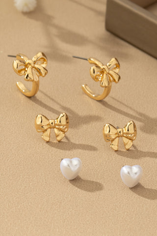Conjunto de Aretes Trio con Lazo, Aro y Corazón de Perla: El Toque Final Perfecto