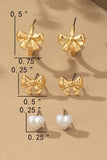 Conjunto de Aretes Trio con Lazo, Aro y Corazón de Perla: El Toque Final Perfecto