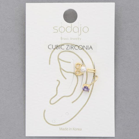 Arete de oreja con cuentas de perla