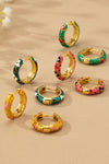 Pendientes de aro Huggie con flores, resistentes al deslustre