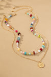 Collar de Cuentas Multicolor de 2 Hileras con Colgante de Estrella: Elegancia Bohemia
