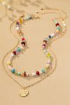 Collar de Cuentas Multicolor de 2 Hileras con Colgante de Estrella: Elegancia Bohemia
