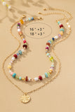 Collar de Cuentas Multicolor de 2 Hileras con Colgante de Estrella: Elegancia Bohemia