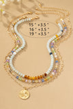 Collar Tricolor con Cuentas y Colgante de Trébol - Elegancia Artesanal