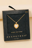 Collar con Colgante de Corazón con Perla Sumergida en Oro: Elegancia Atemporal