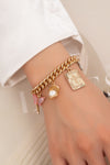 Pulsera de dijes múltiples en cadena de eslabones gruesos