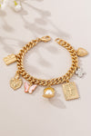 Pulsera de dijes múltiples en cadena de eslabones gruesos