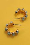 Pendientes de aro turquesa de piedra natural ovalada
