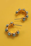 Pendientes de aro turquesa de piedra natural ovalada