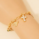 Pulsera de Cadena con Cruz de Querubín y Abalorios de Cereza