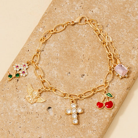 Pulsera de Cadena con Cruz de Querubín y Abalorios de Cereza