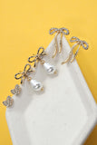 Pendientes con lazo de perla y corazón de diamantes de imitación