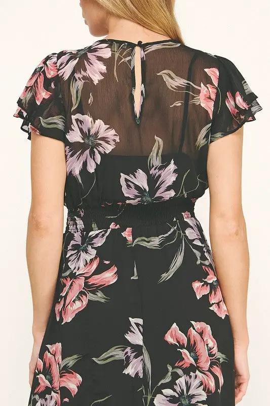 Vestido Negro de Gasa con Estampado Floral y Cintura Fruncida con Volantes by Yanet Collective