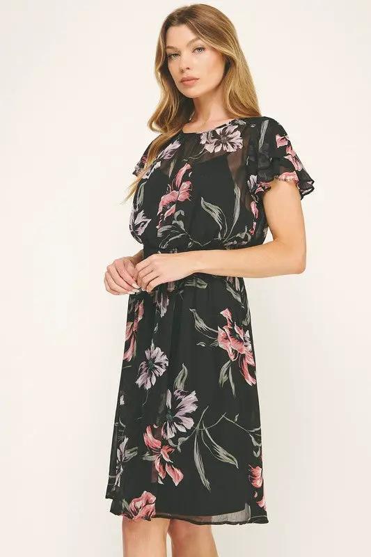 Vestido Negro de Gasa con Estampado Floral y Cintura Fruncida con Volantes by Yanet Collective