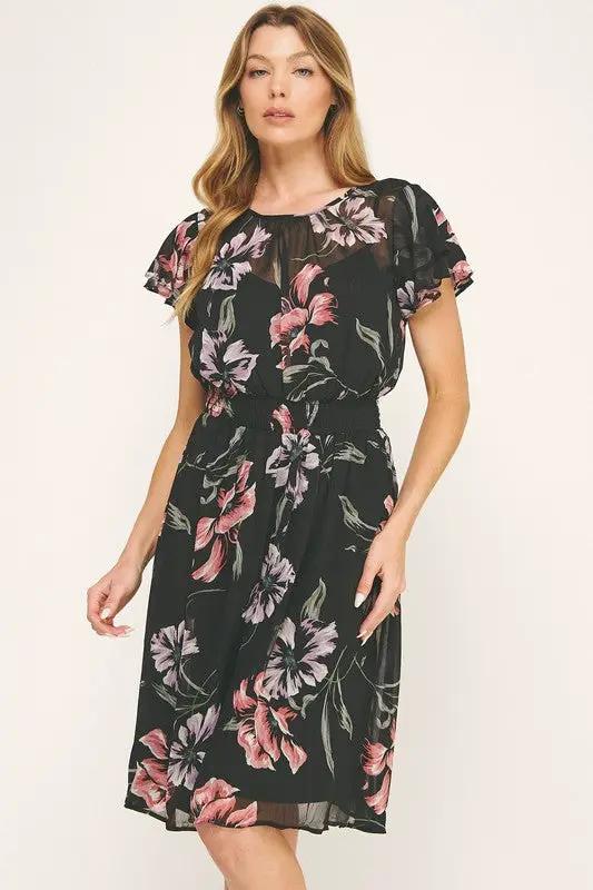 Vestido Negro de Gasa con Estampado Floral y Cintura Fruncida con Volantes by Yanet Collective
