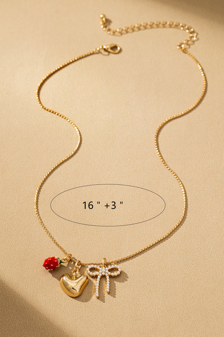 Collar Corazón con Lazo y Fresa - Joyería Artesanal Romántica y Delicada