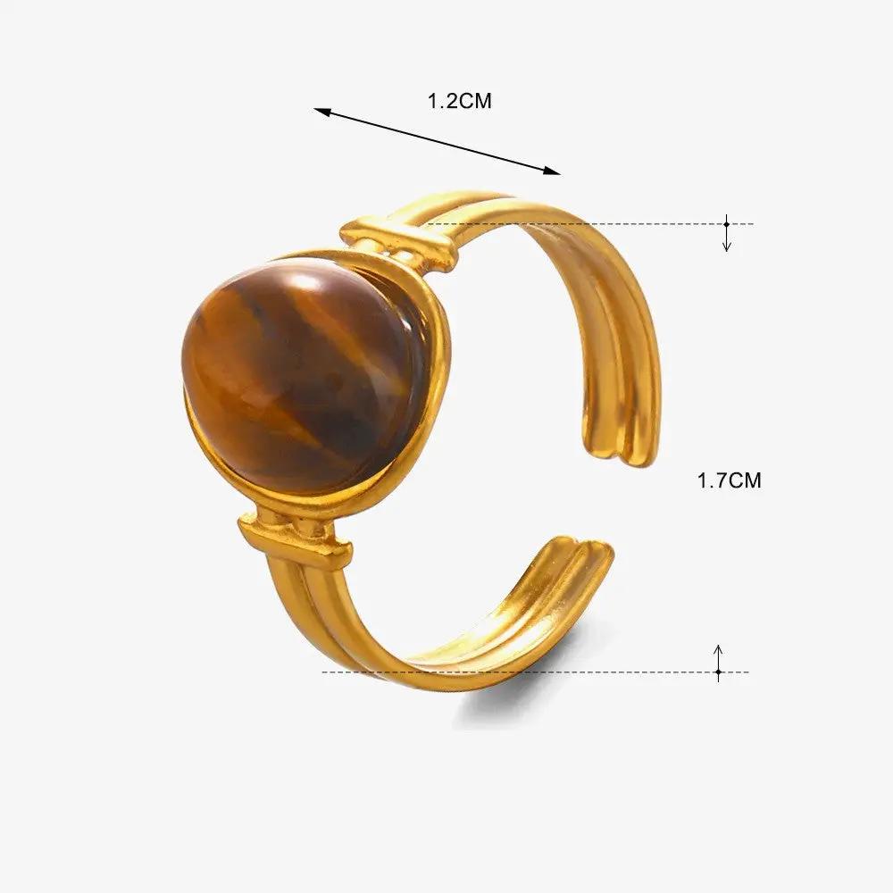 Anillo de Dama Ajustable 18k Oro Laminado Acero Inoxidable con Piedra Natural y Diseño Rayo de Sol by JOSSLYN by Wall to Wall