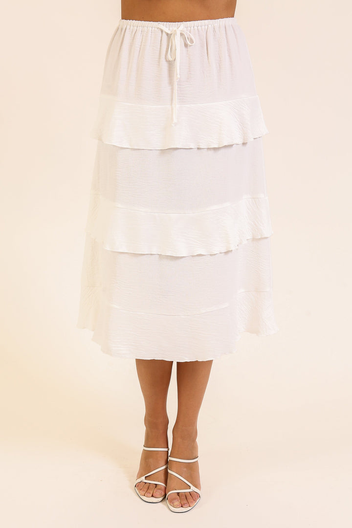 Falda Midi Blanca con Volantes – Estilo Romántico y Ligero