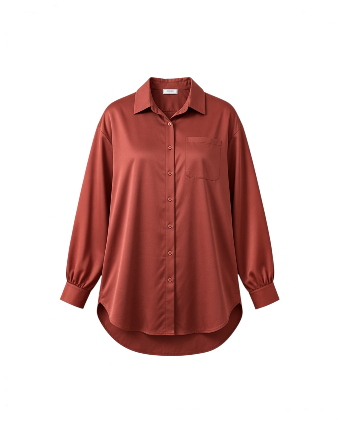 Camisa Yanet Collective de botones color óxido con bolsillo frontal, cuello clásico y ajuste relajado de tela suave.