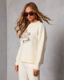 Suéter Tejido con Diseño de Patines de Hielo