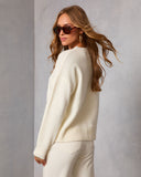 Suéter Tejido con Diseño de Patines de Hielo