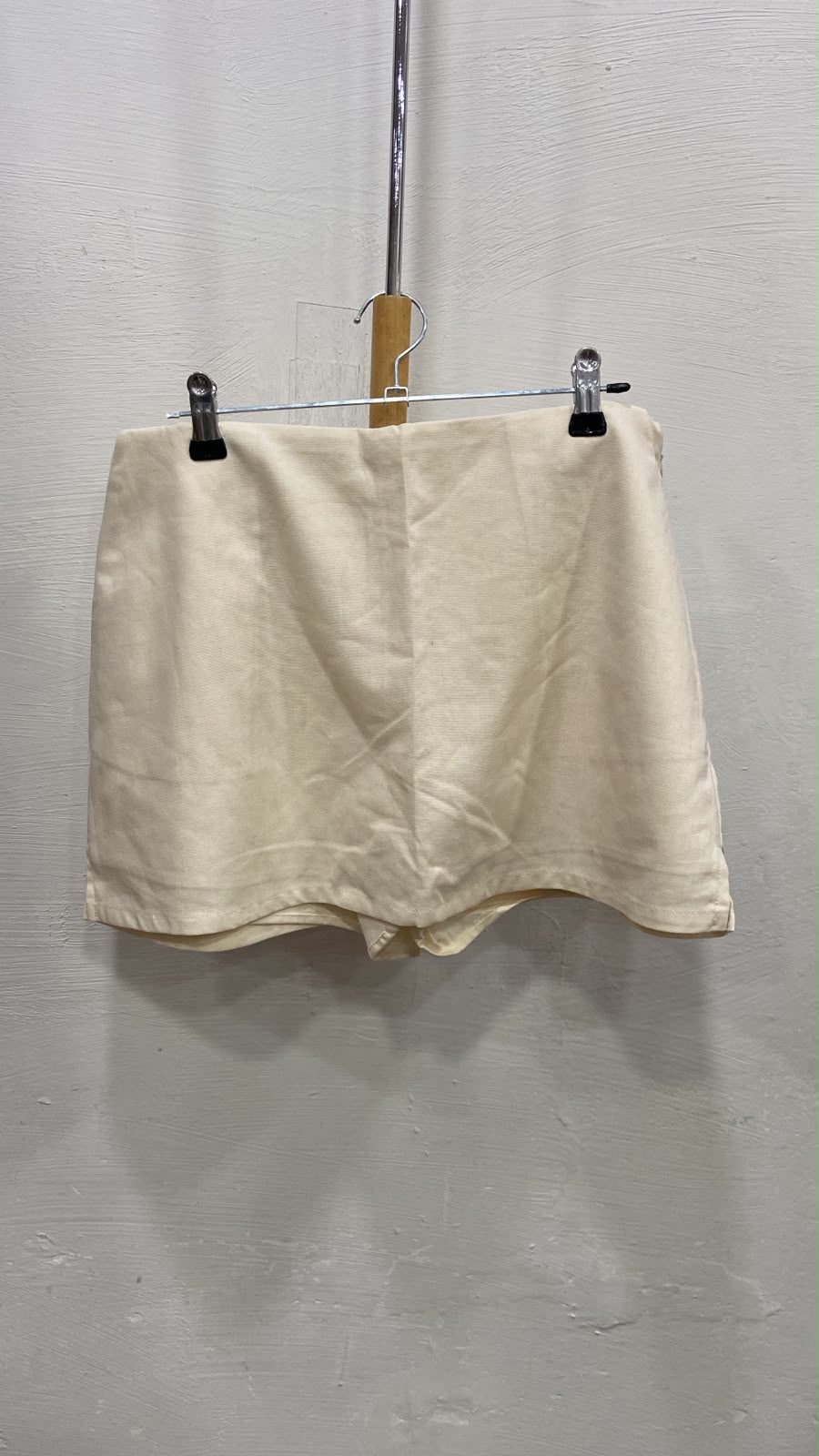 Cream High-Waist Shorts with Curved Hem