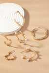 conjunto de pendientes tr’o