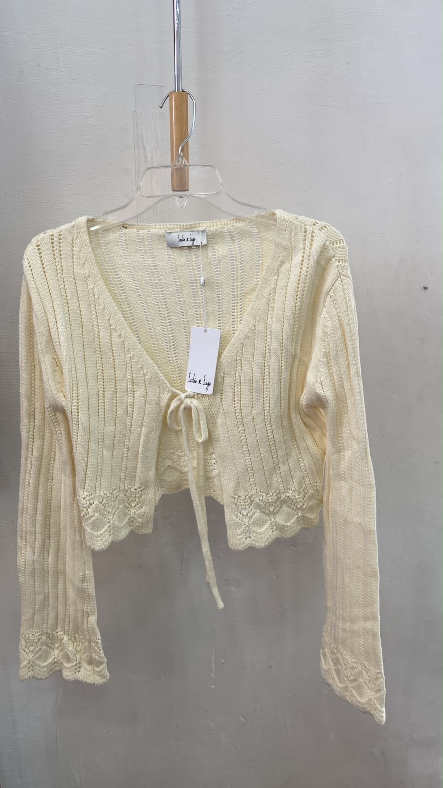 Cárdigan de Punto Crema con Lazo - Estilo Boutique