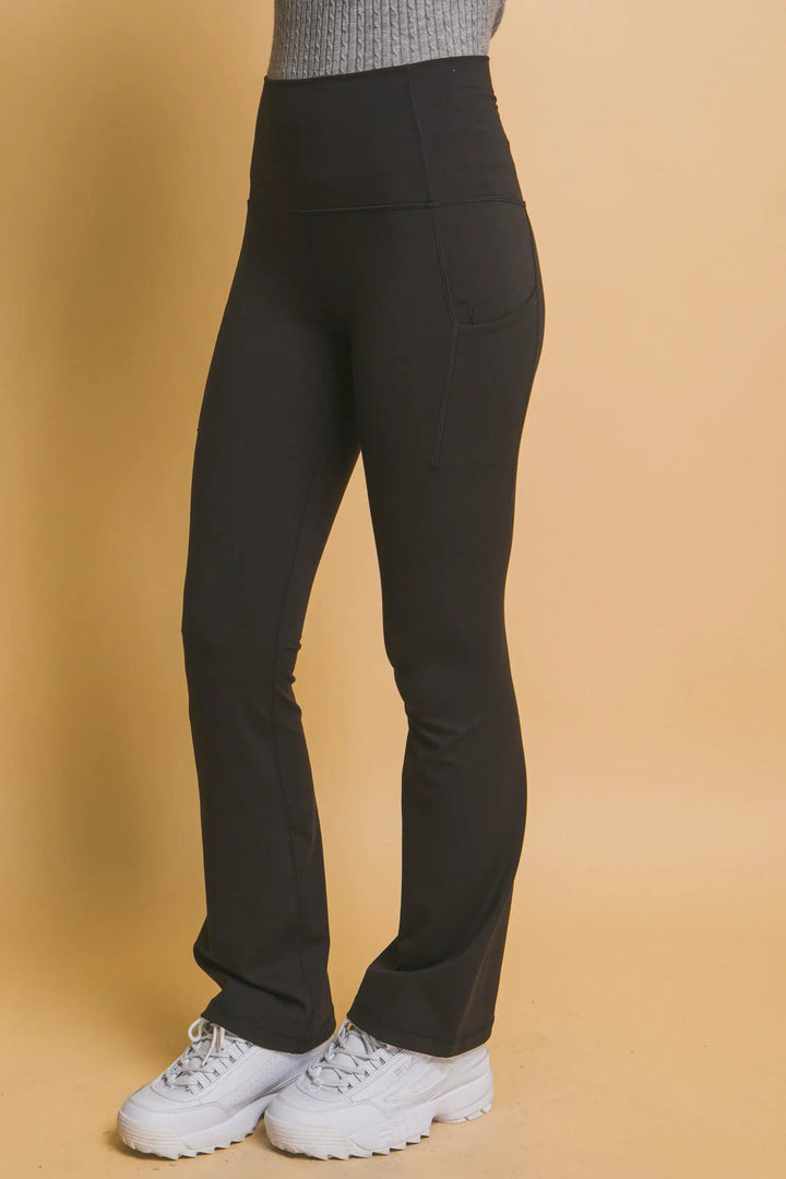 Leggings acampanados de cintura alta con bolsas laterales para mujer | Deportivos cómodos y elásticos by Yanet Collective