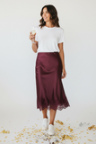 Falda burgundy satin con encaje vino