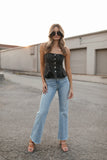 Top mezclilla abotonado strapless